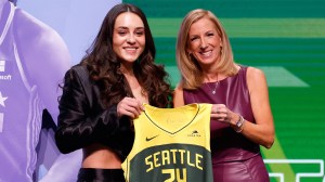 Nika Muhl poses with WNBA Commissioner Cathy Engelbert during Draft