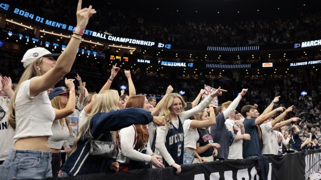 UCONN students cheer on the Huskies during the NCAA Tournament.