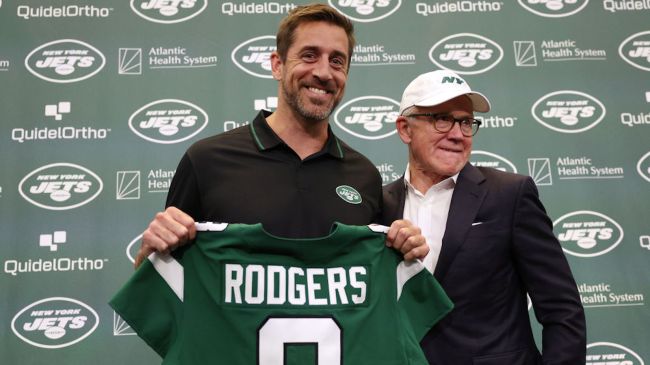 aaron rodgers and woody johnson