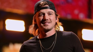 Morgan Wallen Cheeses In Mugshot After Allegedly Throwing Chair Off Rooftop Bar In Nashville