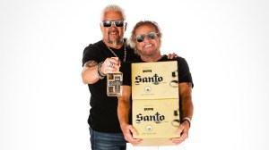 Sammy Hagar and Guy Fieri posing with Santo Tequila