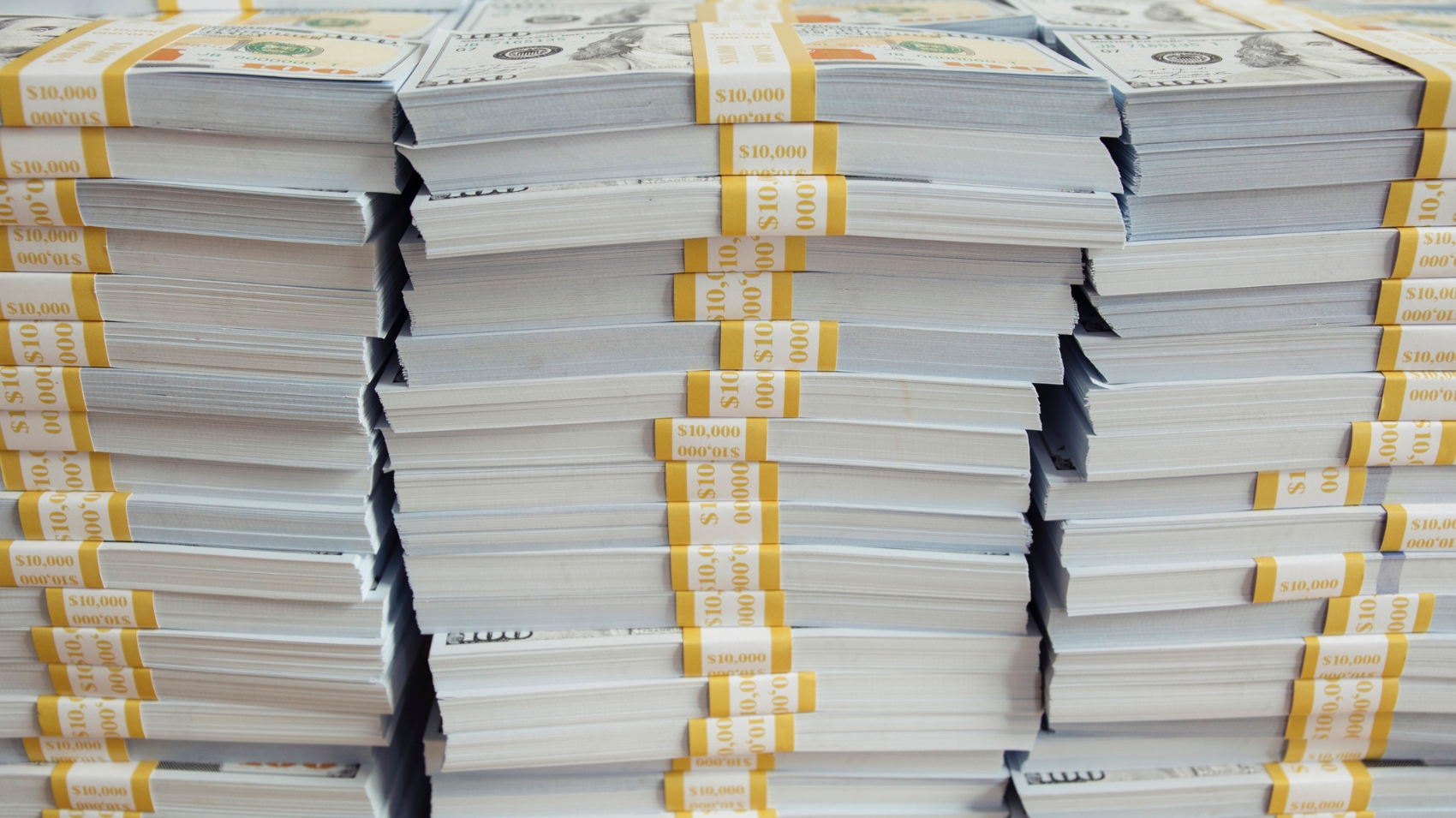 stacks of new $100 bills 