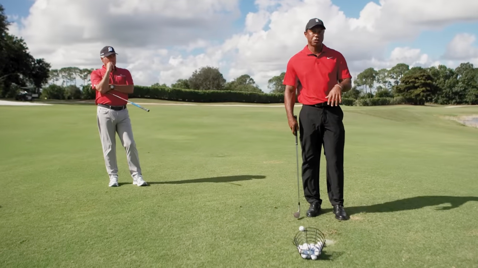 Tiger Woods and Freddie Couples teach how to hit the perfect 50-yard pitch shot