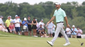 Brian Harman walks on the green after sinking a putt at the PGA Championship.
