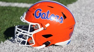 A Florida Gators helmet on the sidelines.