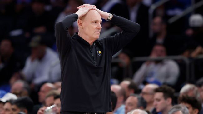 Indiana Pacers head coach Rick Carlisle reacts a to play