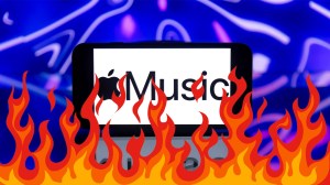 apple music on tablet covered in flames