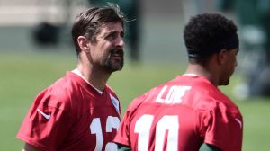 jordan love and aaron rodgers in red shirts