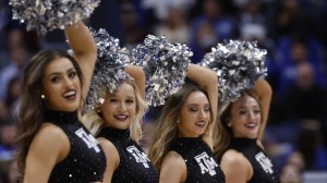 The Texas A&M dance team performs at a basketball game.