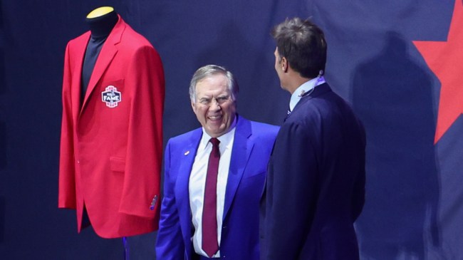 Bill Belichick talks with Tom Brady during the 2024 Hall of Fame Induction Ceremony
