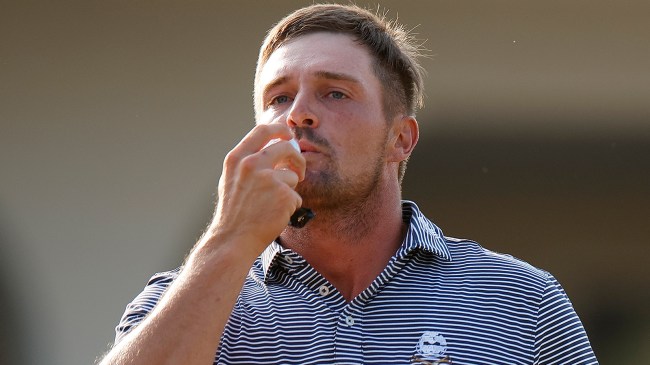 Bryson DeChambeau kissing golf ball after winning U.S. Open