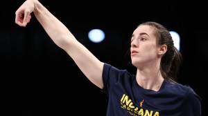 Caitlin Clark warms up before an Indiana Fever game.