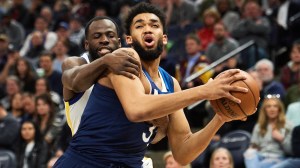 Golden State Warriors forward Draymond Green and Minnesota Timberwolves Karl Anthony Towns