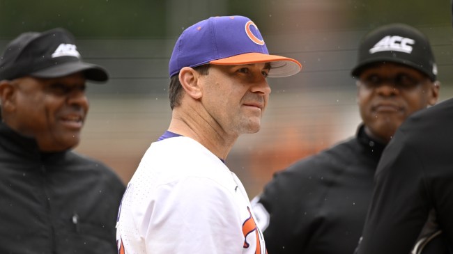 Clemson baseball coach Erik Bakich speaks to umpires before a game.