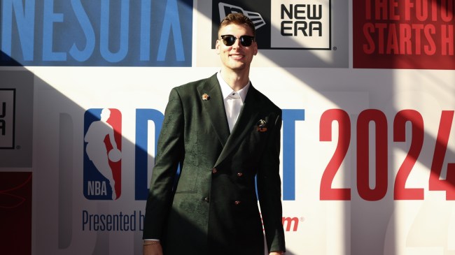 Kyle Filipowski poses for a photo at the NBA Draft.