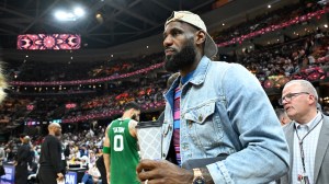 LeBron James attends an Eastern Conference playoff game between the Boston Celtics and Cleveland Cavaliers.