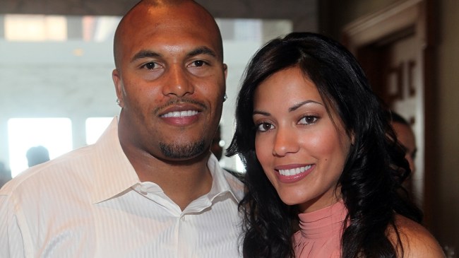 Antonio Pierce and wife, Jocelyn, pose for a photo.