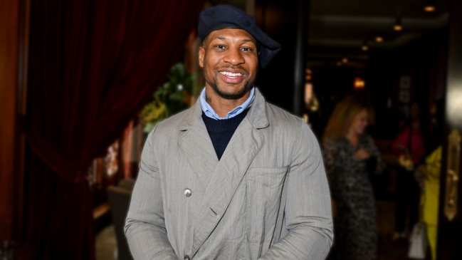 jonathan majors wearing a beret