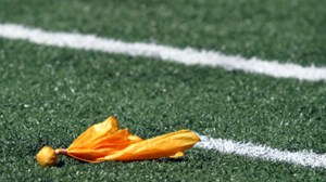 A penalty flag on the football field.