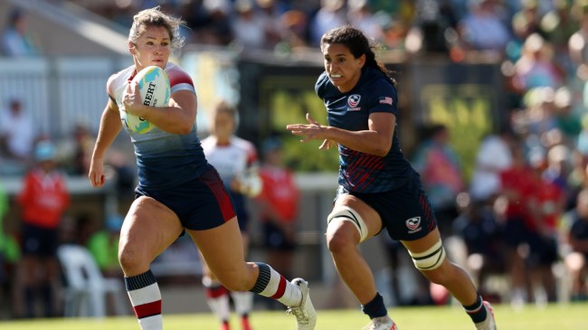 Amy Wilson-Hardy runs the ball for Great Britain against the USA.