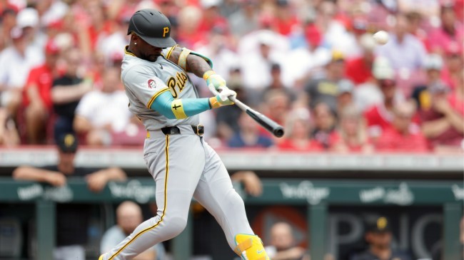 Andrew McCutchen hits a home run against the Reds.