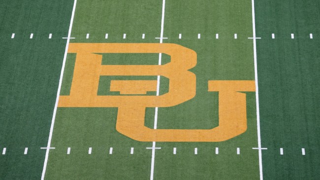 A Baylor Bears logo at midfield of McLane Stadium.