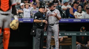 San Francisco Giants manager Bob Melvin talks with an umpire.