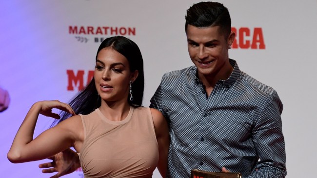 Cristiano Ronaldo and girlfriend Georgina Rodriguez pose for a photo.
