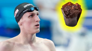 Norwegian swimmer Henrik Christiansen staring at chocolate muffin
