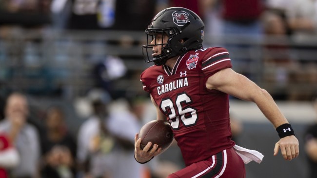 Hunter Rogers scores a touchdown for the South Carolina Gamecocks.
