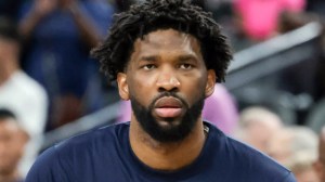 Joel Embiid warms up for Team USA at an exhibition game ahead of the Paris Olympics.