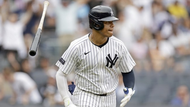 Yankees OF Juan Soto flips his bat after hitting a home run against the Rays.