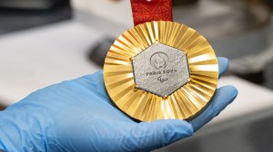 2024 Paris Olympic Gold Medal with Eiffel Tower piece embedded