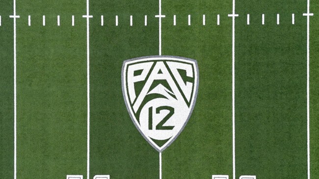 A PAC-12 logo on the Oregon Ducks' football field.