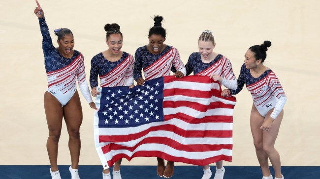Simone Biles celebrates with Team USA at the Paris Olympics.