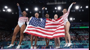 Team USA gymnasts celebrate winning the gold medal