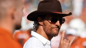 Actor Matthew McConaughey on the sidelines during a game between the Texas Longhorns and Oklahoma Sooners.