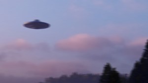 UFO over the mountain forest