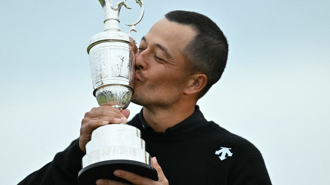 Xander Schauffele kissing Claret Jug after winning British Open