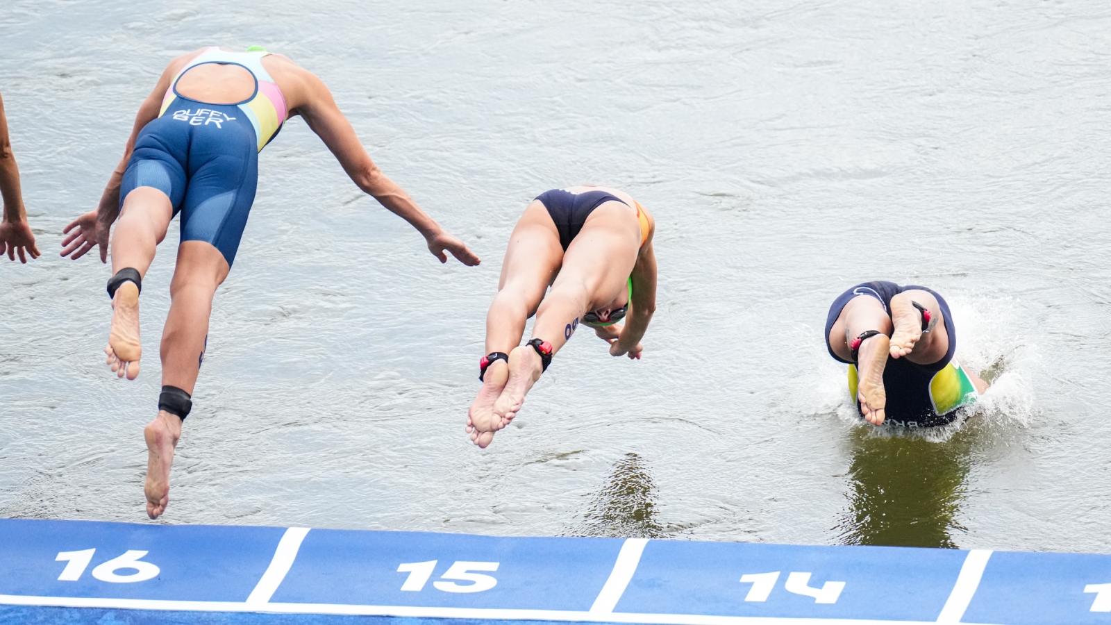 Triathlon Racers Triathlon Racers' Eagerness To Dive In Seine River Proves Costly