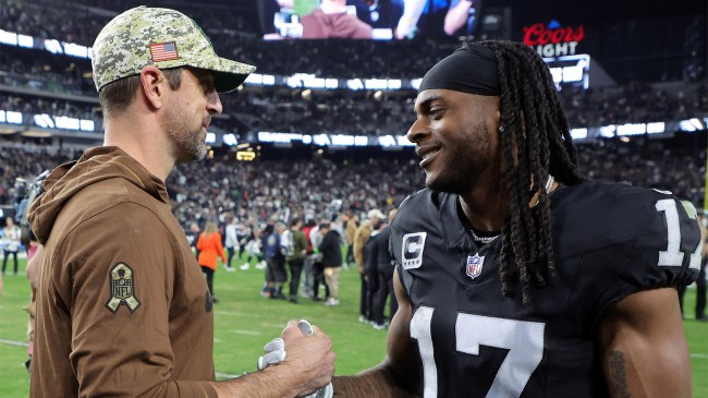 Aaron Rodgers talks with wide receiver Davante Adams