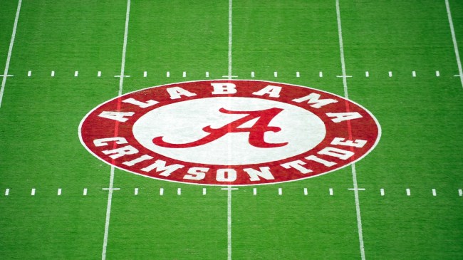 An Alabama Crimson Tide logo at midfield.