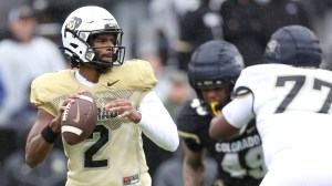 Shedeur Sanders drops back to throw during Colorado Buffaloes football practice.