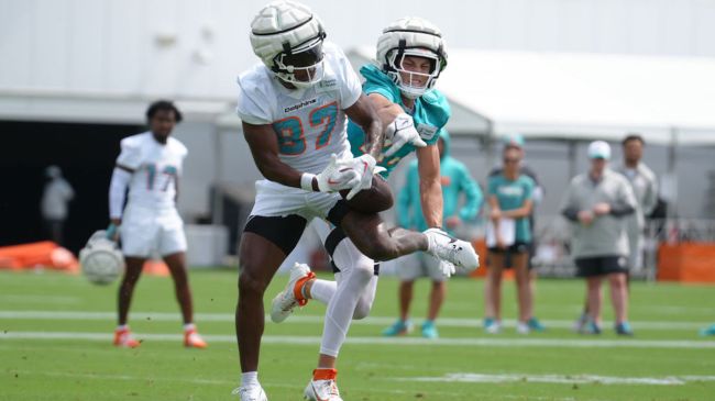 Ethan Bonner of the dolhpins defending a pass