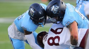 Old Dominion linebacker Jason Henderson makes a tackle.