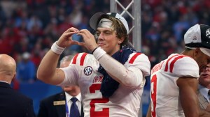 Jaxson Dart celebrates after Ole Miss's bowl win.