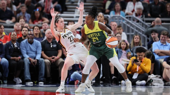 Indiana Fever star Caitlin Clark defends Seattle Storm guard Jewell Lloyd.