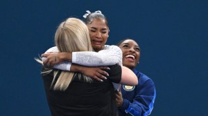 Jordan Chiles celebrates with coach Cecile Landi.