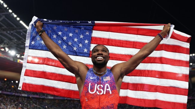 Noah Lyles celebrates after winning gold in the 100m at the Paris Olympics.