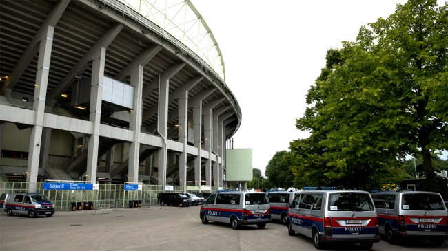 Police cars park outside Ernst-Happel-Stadion at Taylor Swift concerts